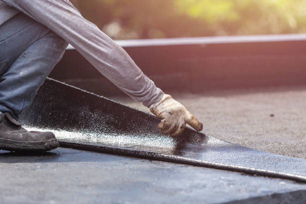 Professional Basement Waterproofing technician working in Pavilion, NY